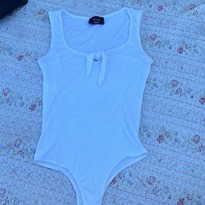 white body suit with tie